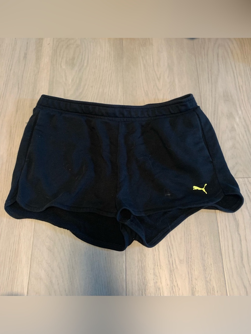 M Puma Women's Black Athletic Shorts with Yellow Puma Logo